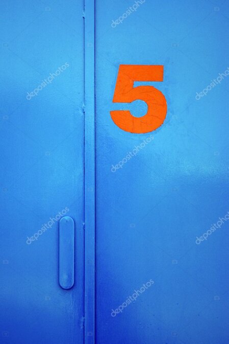 Portone a libro installato su un capannone industriale